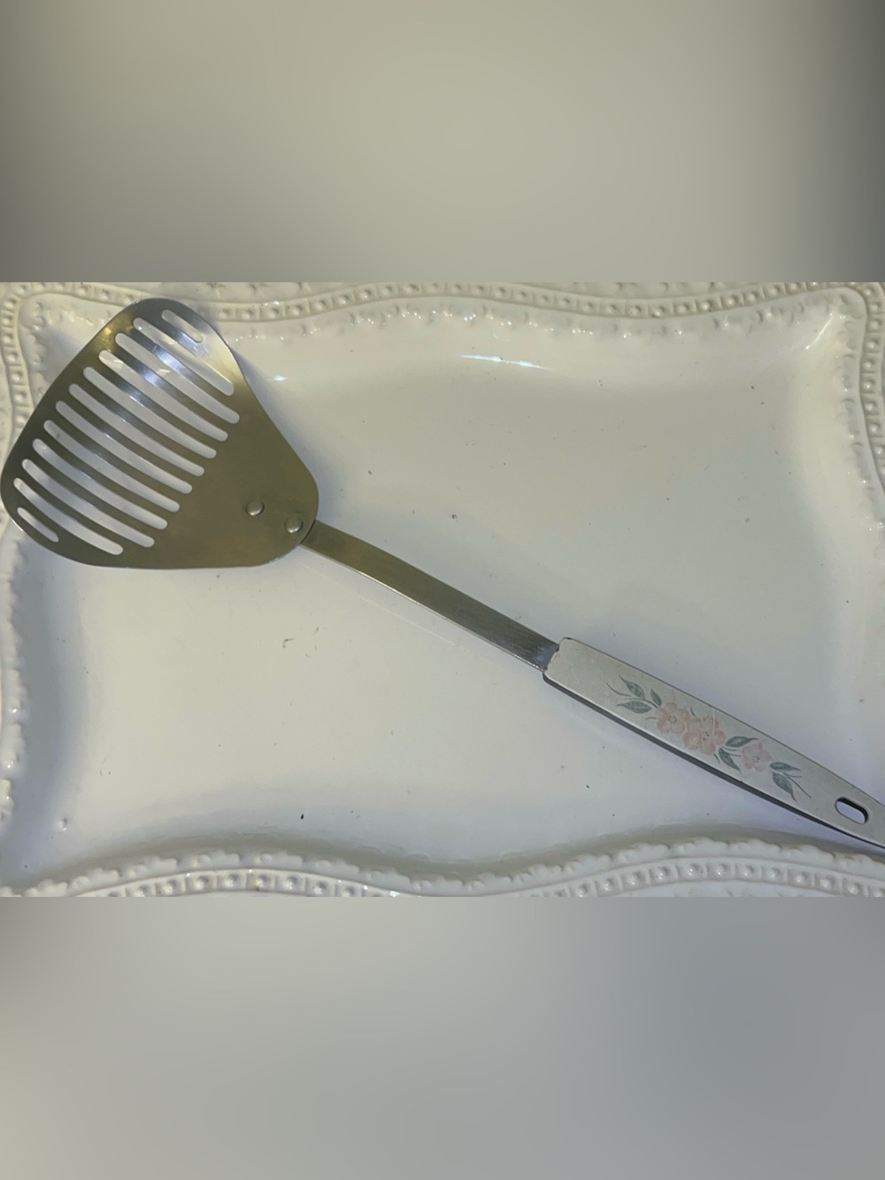 Kitchamajig slotted strainer and spatula, featuring a floral patterned handle